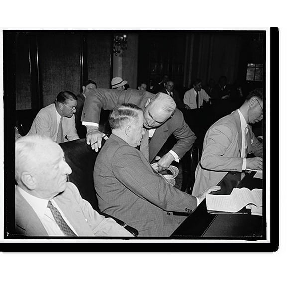 Historic Print, Off-the-record. Washington, D.C., July 19. Just before appearing before the Senate banking and Currency Committee today regarding the President's lending program, John J., 16" x 20"