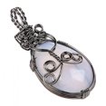 thumbnail image 4 of Ambre de bobinado Colgantes Piedra Joyería Fabricación de colres Marfil Zulema colgantes de cristal sinuosos, 4 of 8