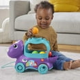 thumbnail image 4 of Fisher-Price Toddler Learning Toy, Dinosaur Pull Toy Multi-Language Version, Poppin’ Triceratops, 4 of 7