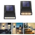 thumbnail image 1 of Luces solares para jardín, 2 luces LED de pared para exteriores, impermeables IP65, con movimiento vertical para portones, vallas, paredes, decoración de jardín e iluminación de caminos., 1 of 5