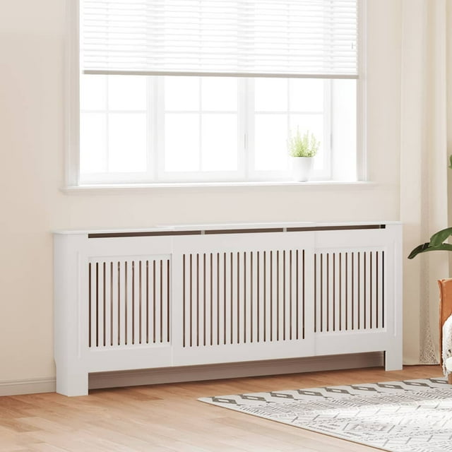 vidaXL Radiator Cover with Top Storage Shelf, Heater Cover, MDF, 55.5-80.7''x7.5''x32.1'', White. This adjustable radiator cover features a modern slatted design in white MDF, blending functionality and style. It includes a top shelf for displaying books, photo frames, or ornaments, and measures 142-205 cm wide, 20.5 cm deep, and 81.5 cm high. Suitable for various home decors, assembly required.