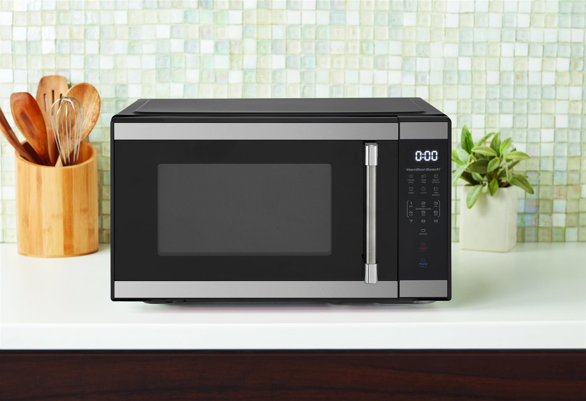 Oster Countertop Microwave Stainless Steel Black 1.1 cu. Ft. 1000-Watt with  Push Button 985116503M - The Home Depot