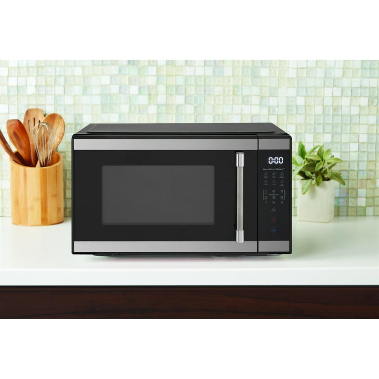 Best Buy: Oster 1.1 Cu. Ft. Mid-Size Microwave Stainless-Steel