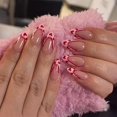 thumbnail image 1 of Press on Nails BUNLVDI Valentine Medium Almendra Pink con corazón, 1 of 7