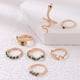 thumbnail image 4 of Anillo de serpiente con diamantes geométricos y anillo de siete piezas con animales del zodíaco, 4 of 6