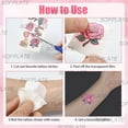 thumbnail image 4 of 20 hojas de tatuajes temporales luminosos de corazón rosa que brillan en la oscuridad, de plástico, resistentes al agua, para arte corporal., 4 of 7