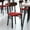 Walnut Wood Back/Red Vinyl Seat, variant on BizChair Set of 2 Commercial Dining Chairs with 500 LB. Capacity Black Steel Frame, Natural Birch Finish Wooden Boomerang Back, and Red Vinyl Seat