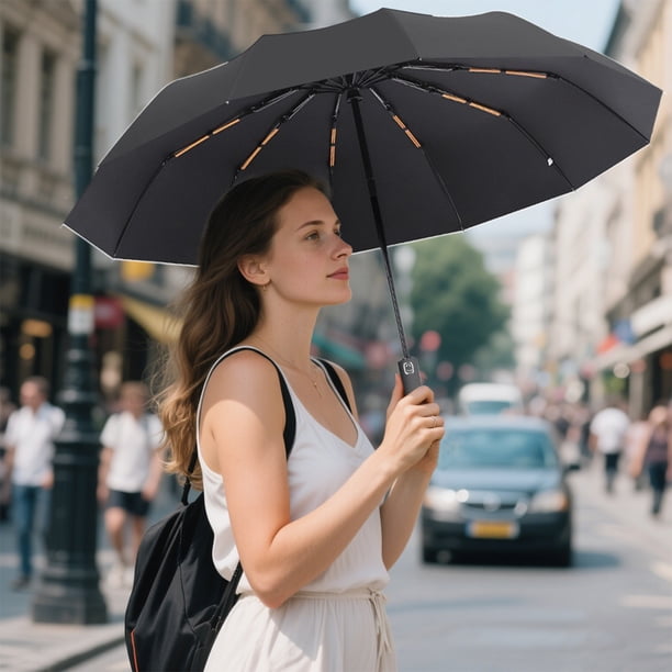 Paraguas automático plegable de plástico negro para exteriores, ideal para protegerse del sol y la lluvia. Paraguas de poliéster.