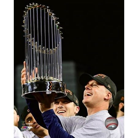 A.J. Hinch with the World Series Championship Trophy Game 7 of the 2017 World Series Photo Print (11 x 14)