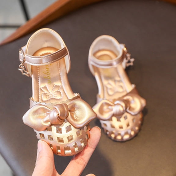 XIMIN Girls Cutout Closed Toe Summer Sandals with Satin Bowknot Adjustable Buckle Strap Non Slip Rubber Sole for Casual Party Wear (Gold, 5.5-6Years)