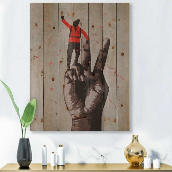 Designart 'Man With Arm Raised On Victory Sign' Modern Print on Natural Pine Wood