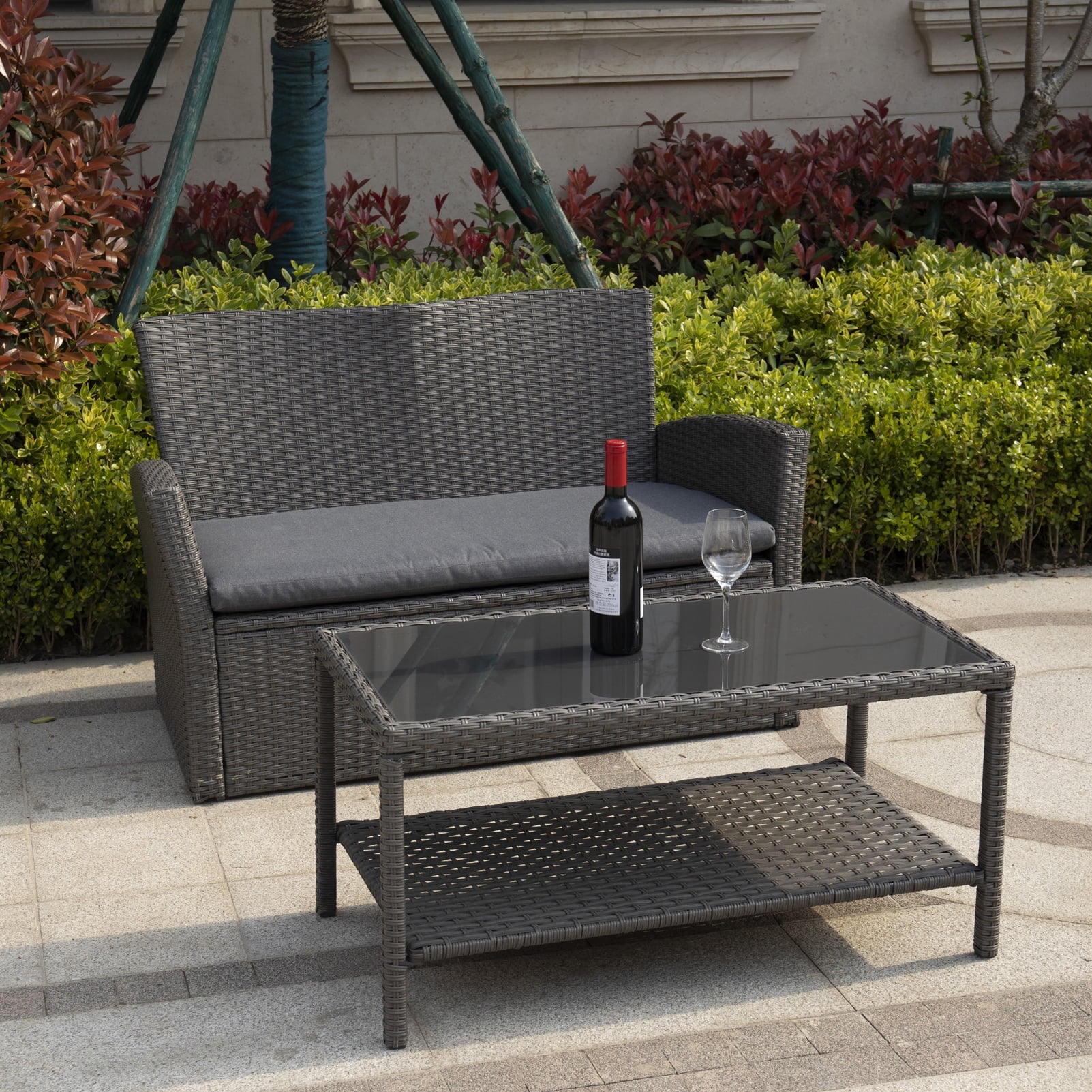 small wicker table with glass top