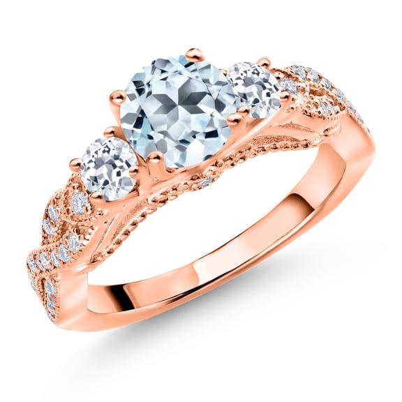 Gem Stone King 18K Rose Gold Plated Silver Sky Blue Topaz White Topaz and White Moissanite Engagement Ring for Women (1.55 Cttw, Gemstone November Birthstone, Round 6MM and 3MM, Size 9)
