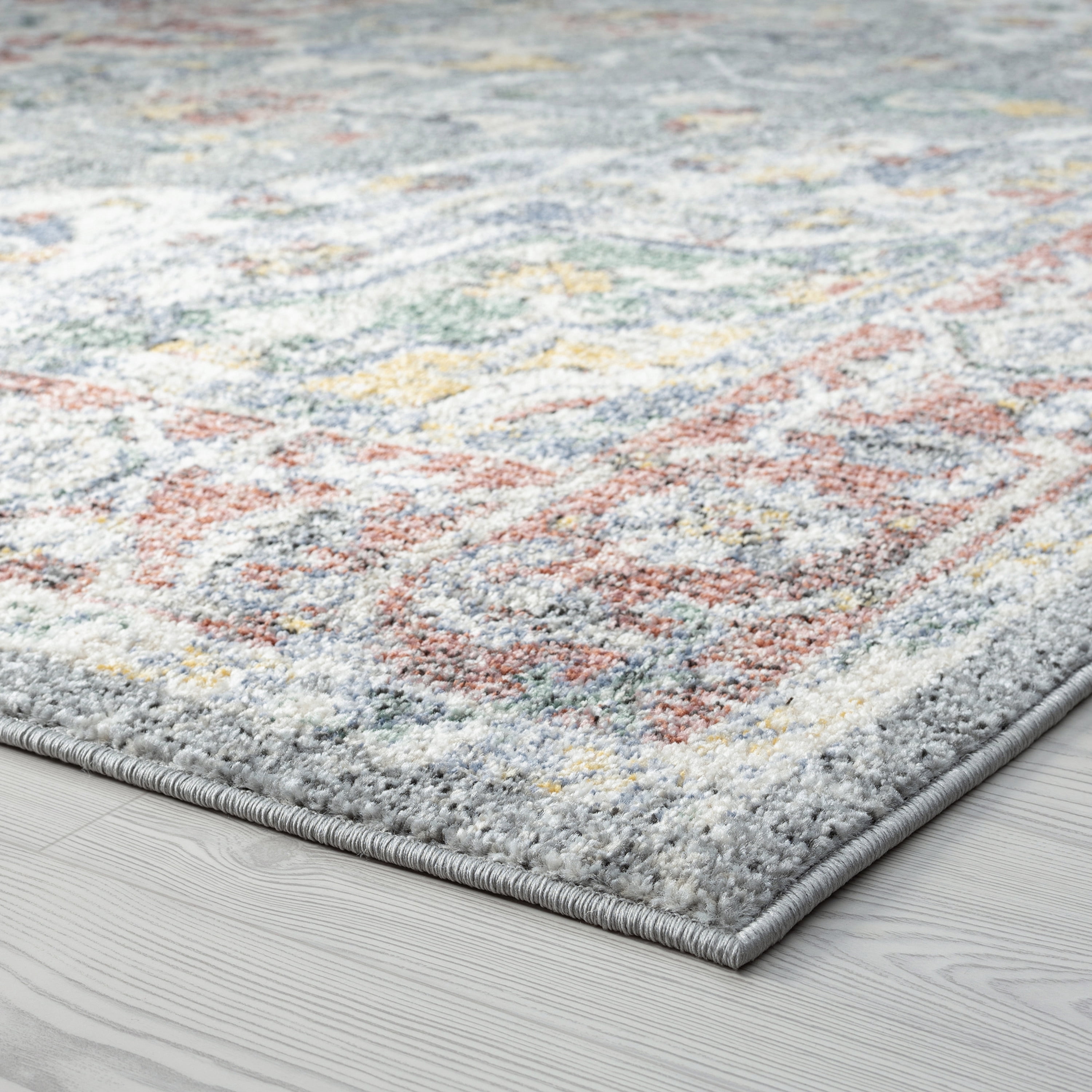 Addison Traditional 5' x 7' Gray and Rust Polypropylene Indoor Area Rug