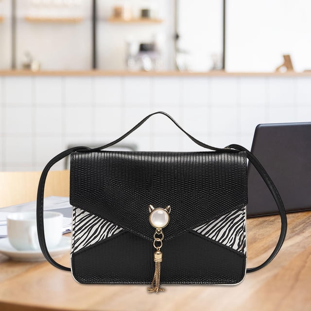 Bolsos de hombro con solapa Yinane para mujer, Bolso de compras negro, correa ajustable, elegante borla, bolsillo con cerrojo