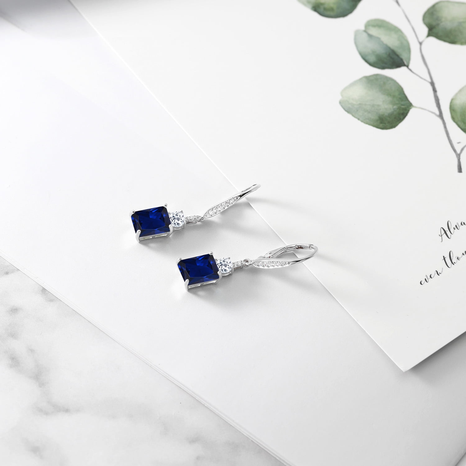 Gem Stone King 925 Sterling Silver Blue Created Sapphire and White Topaz Dangle Earrings for Women (6.06 Cttw, Gemstone September Birthstone, Octagon 9X7MM)