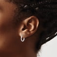 thumbnail image 3 of 925 Sterling Silver Rhodium Plated Women's 2mm Diamond Cut Tube Hoop Earrings | 13mm, 3 of 4