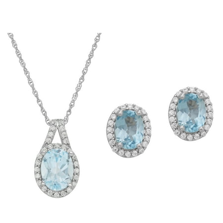 Sterling Silver Oval Cut Sky Blue Topaz And Cubic Zirconia Accent Pendant and Earrings Set, 18 Chain