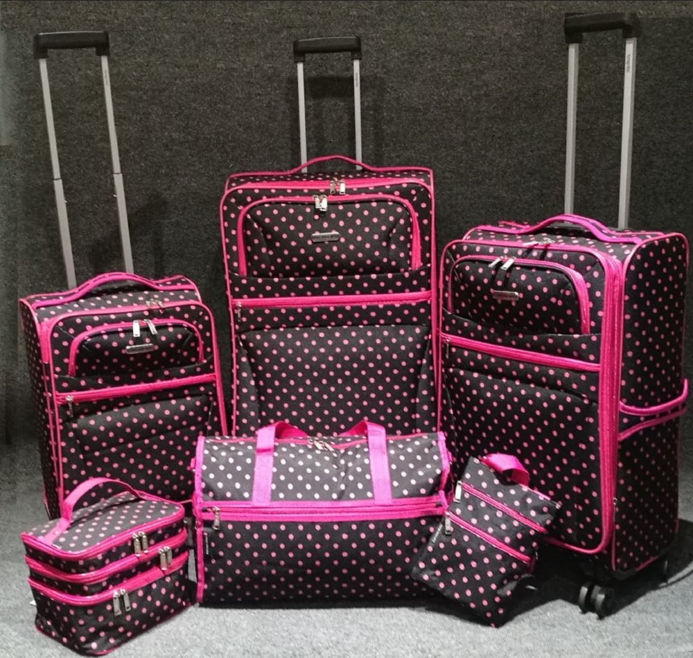 pink and black luggage