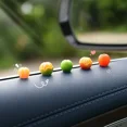 thumbnail image 4 of Simulación de adorno de coche naranja Mini coche naranja Consola central Adorno Espejo retrovisor Lindo interior Accesorios decorativos para automóvil, 4 of 5