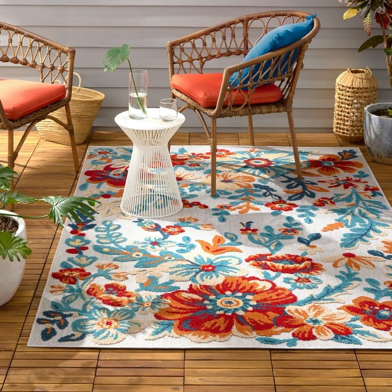 7' X 10' Ivory And Blue Floral Stain Resistant Indoor Outdoor Area Rug