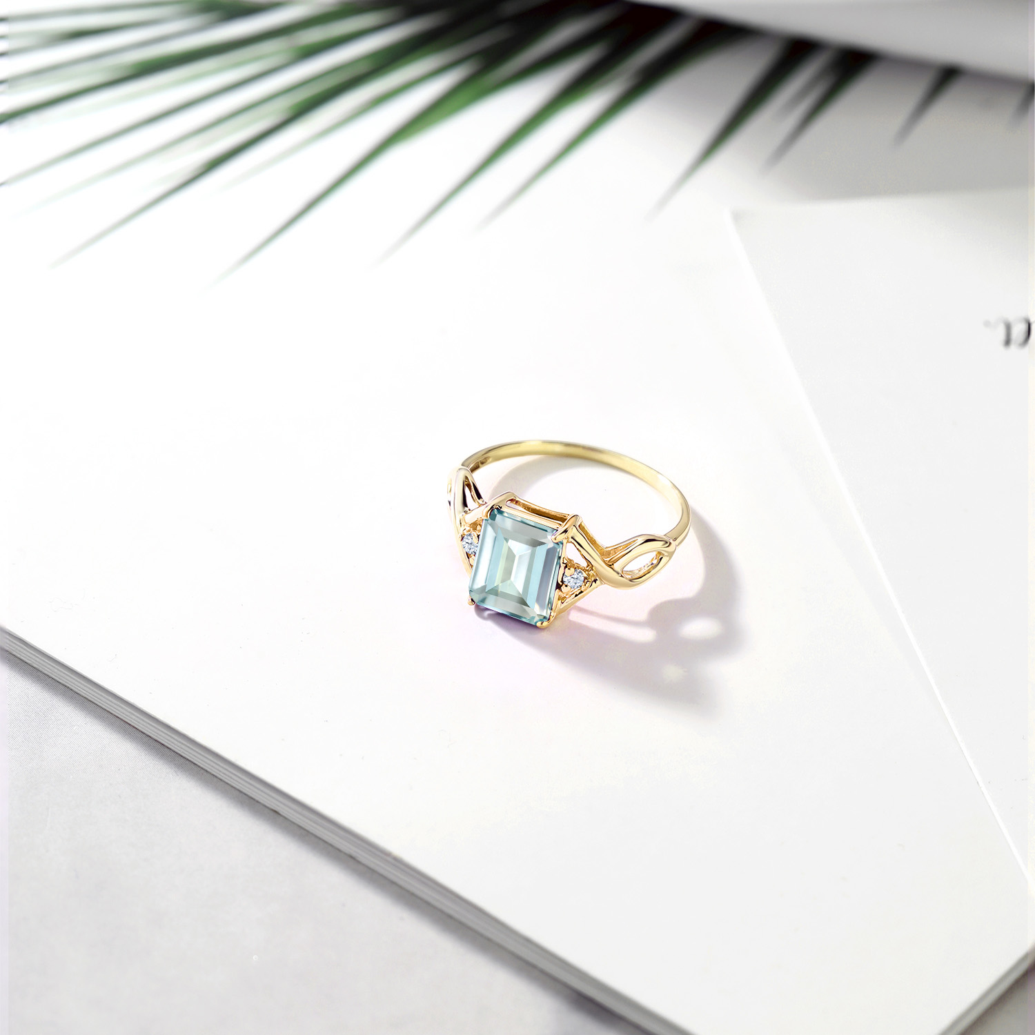 Gem Stone King 2.33 Ct Sky Blue Simulated Aquamarine and White Created Sapphire 3-Stone Ring for Women | 18K Yellow Gold Plated Silver | Wedding Engagement Anniversary Promise Ring for Women | Size 6