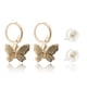 thumbnail image 1 of Set de dos pares de aretes CYRA modelo mariposa y perla, 1 of 2