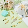 thumbnail image 4 of 20 llaveros de flores de aleación de esmalte de 10 colores, 45 mm, con diseño de margaritas, llaveros estéticos., 4 of 5