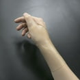 thumbnail image 1 of Silicone Thumb Wrist Compression Glove Tendonitis  Clear, 1 of 9