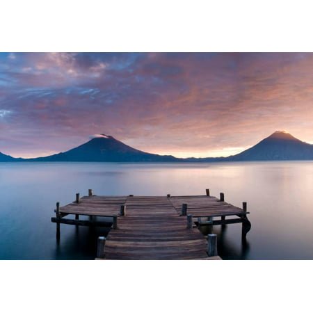 Jetty in a lake with a mountain range in the background, Lake Atitlan, Santa Cruz La Laguna, Wes... Print Wall