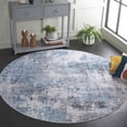 thumbnail image 2 of SAFAVIEH Santa Monica Norbert Abstract Polyester Area Rug, Ivory/Blue, 6' x 6' Round, 2 of 7