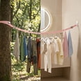 thumbnail image 4 of Portable Adjustable Clothesline, No Drill Clothes Hanger, Multi Hook System for Indoor Outdoor Use, Travel-Friendly Storage Solution, Roll-Up Design, 4 of 7