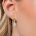 thumbnail image 3 of Gem Stone King 10K Yellow Gold White Moissanite and Lab Grown Diamond Stud Dangle Earrings for Women | 1.39 Cttw | Gemstone Birthstone | Pear Shape 7X5MM, 3 of 6