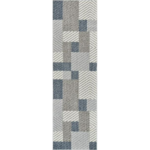 Geometric patterned indoor outdoor area rug featuring abstract blocks in grey, blue, and white for living room or bedroom use.