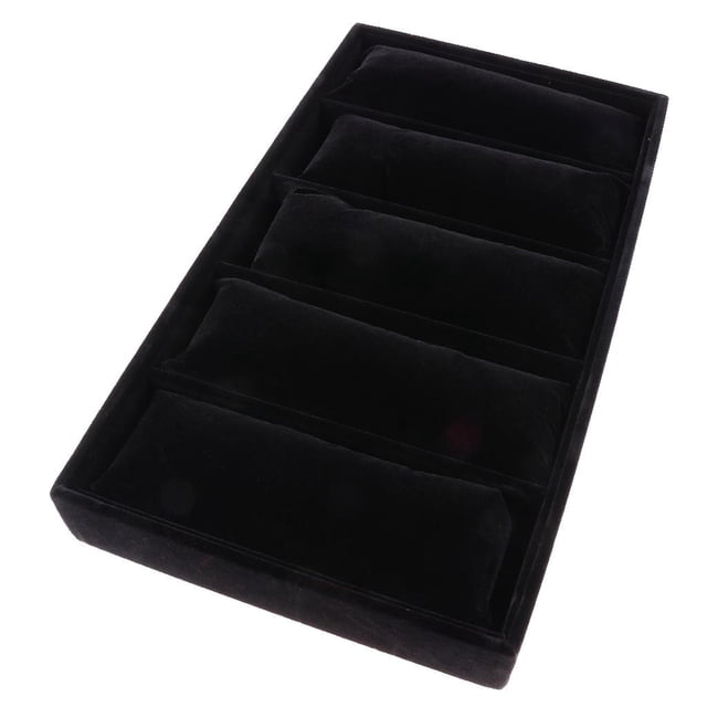 caja de almacenamiento hugo reloj almohada negro organizador de joyería 43 x 24 x 5 cm; bandeja rectangular vista 3/4 con cinco ranuras y almohadas extraíbles forradas en terciopelo negro para relojes, pulseras y brazaletes, interior y bordes negros. Su tamaño compacto la hace adecuada también para almacenar pequeños accesorios de viaje.