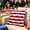 B, variant on Red White Blue Lumbar Pillow, Flag Bow Patriotic Throw Cushion, Vibrant Usa Themed Home Ornament To Spruce Up Indoor Space On Fourth of July Celebrations.