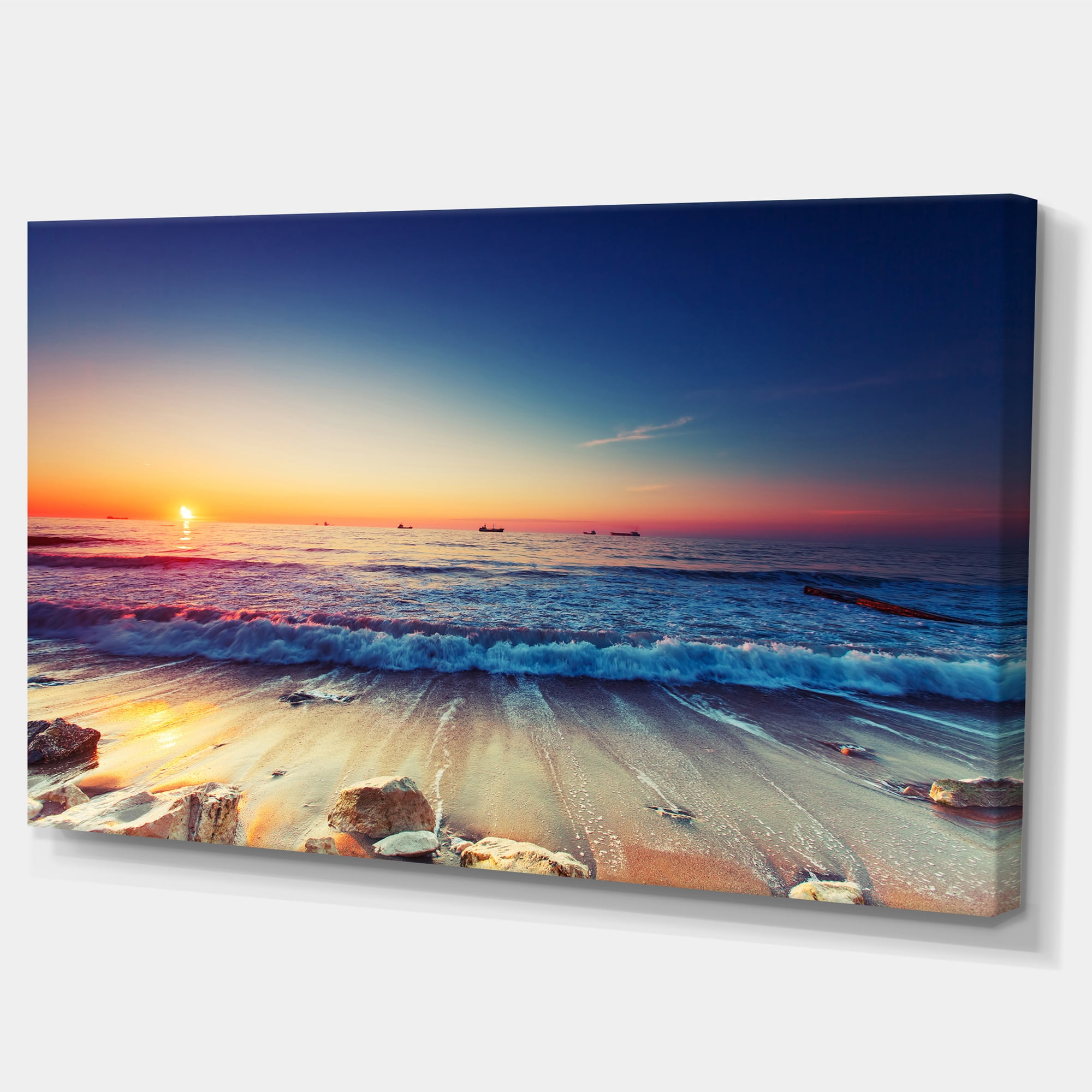 Designart 'Beautiful Sunrise over Blue Sea ' Seashore Canvas Art Print