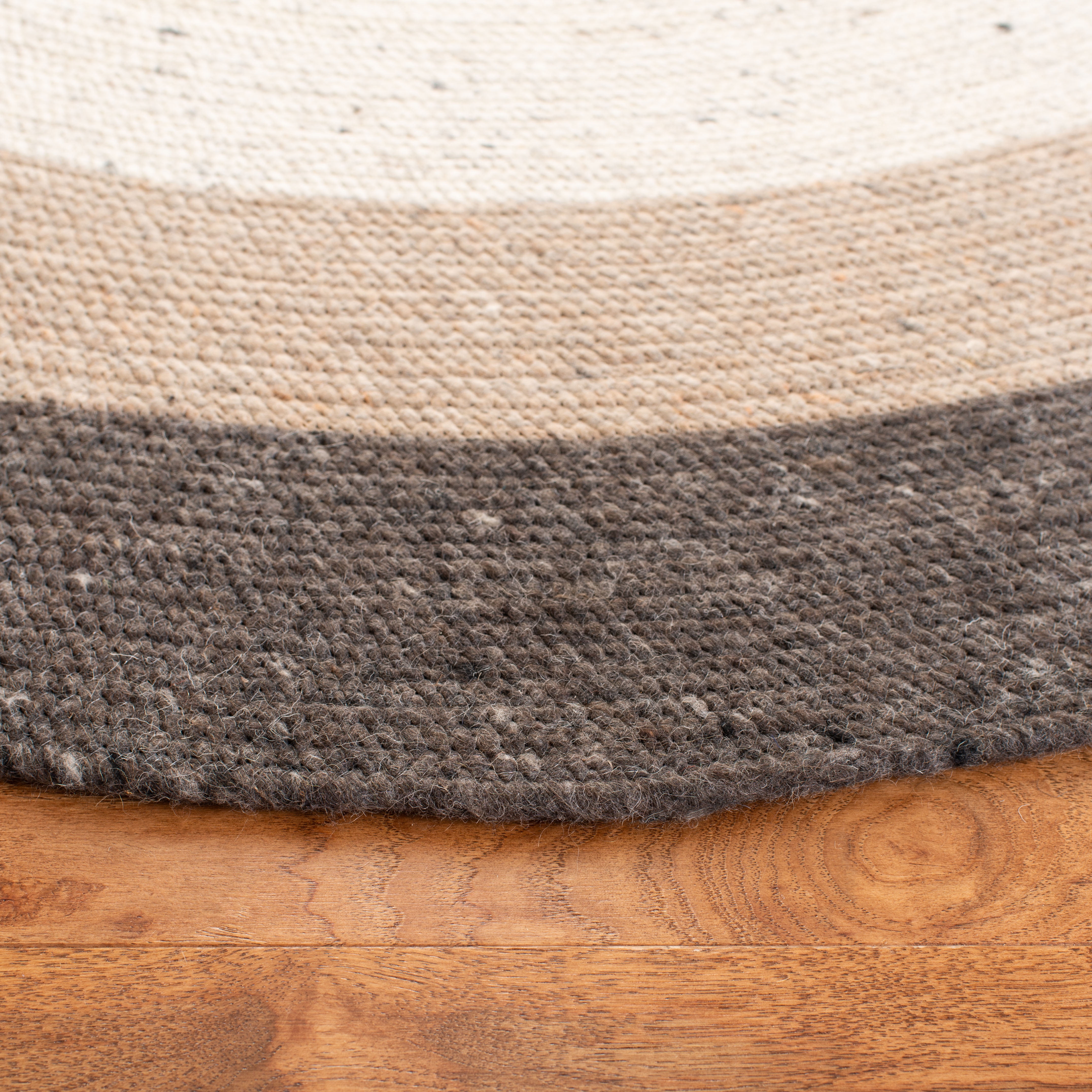 SAFAVIEH Braided Nazca Geometric Reversible Area Rug, Charcoal/Ivory, 7' x 7' Round