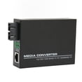 thumbnail image 1 of Convertidor de medios Gigabit Fast Ethernet monomodo dual SC 10 100 1000Base Tx RJ 45 Convertidor de medios de fibra para el hogar 100‑240V Enchufe estadounidense, 1 of 12