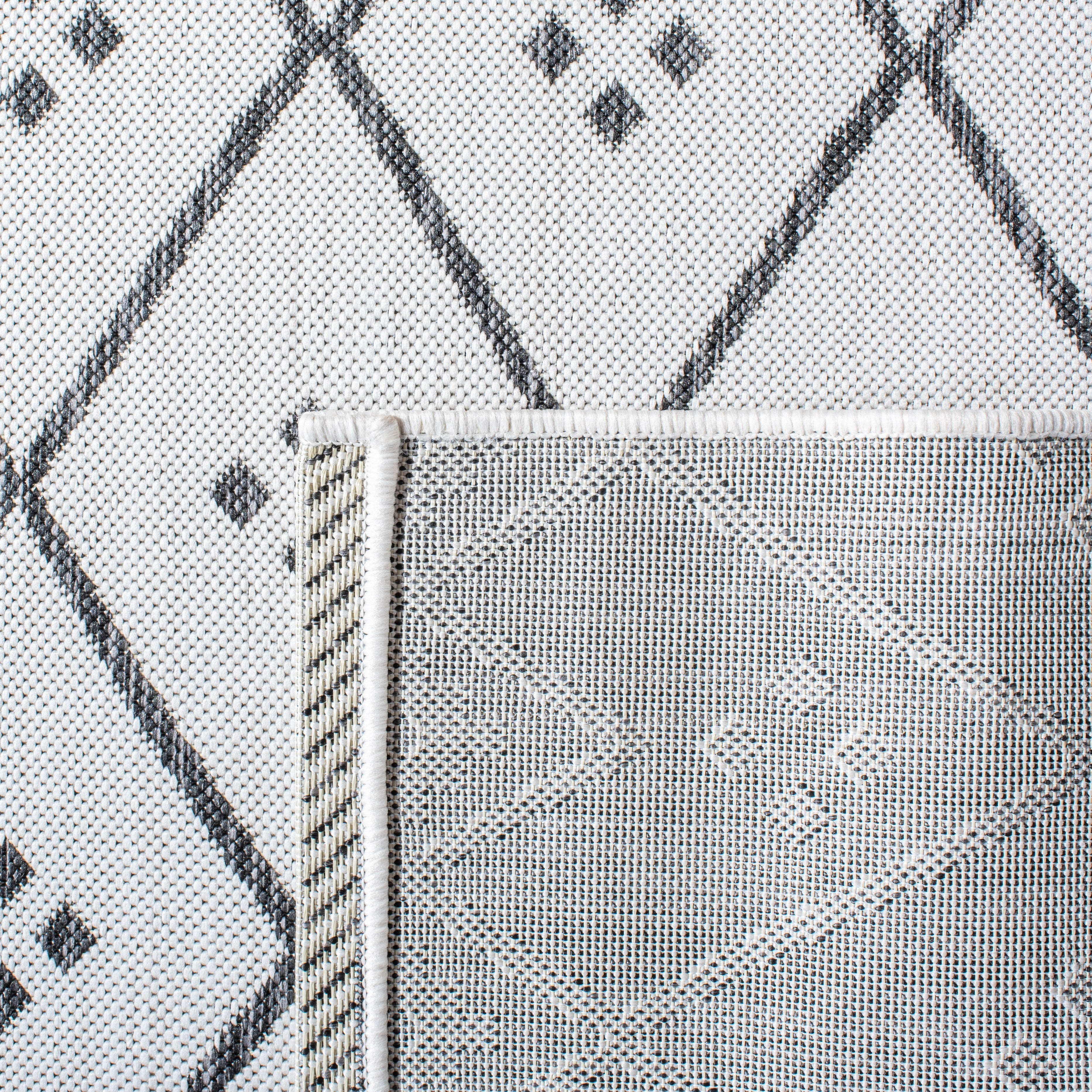 SAFAVIEH Courtyard Wasif Geometric Indoor/Outdoor Area Rug, Ivory/Black, 2' x 3'7"