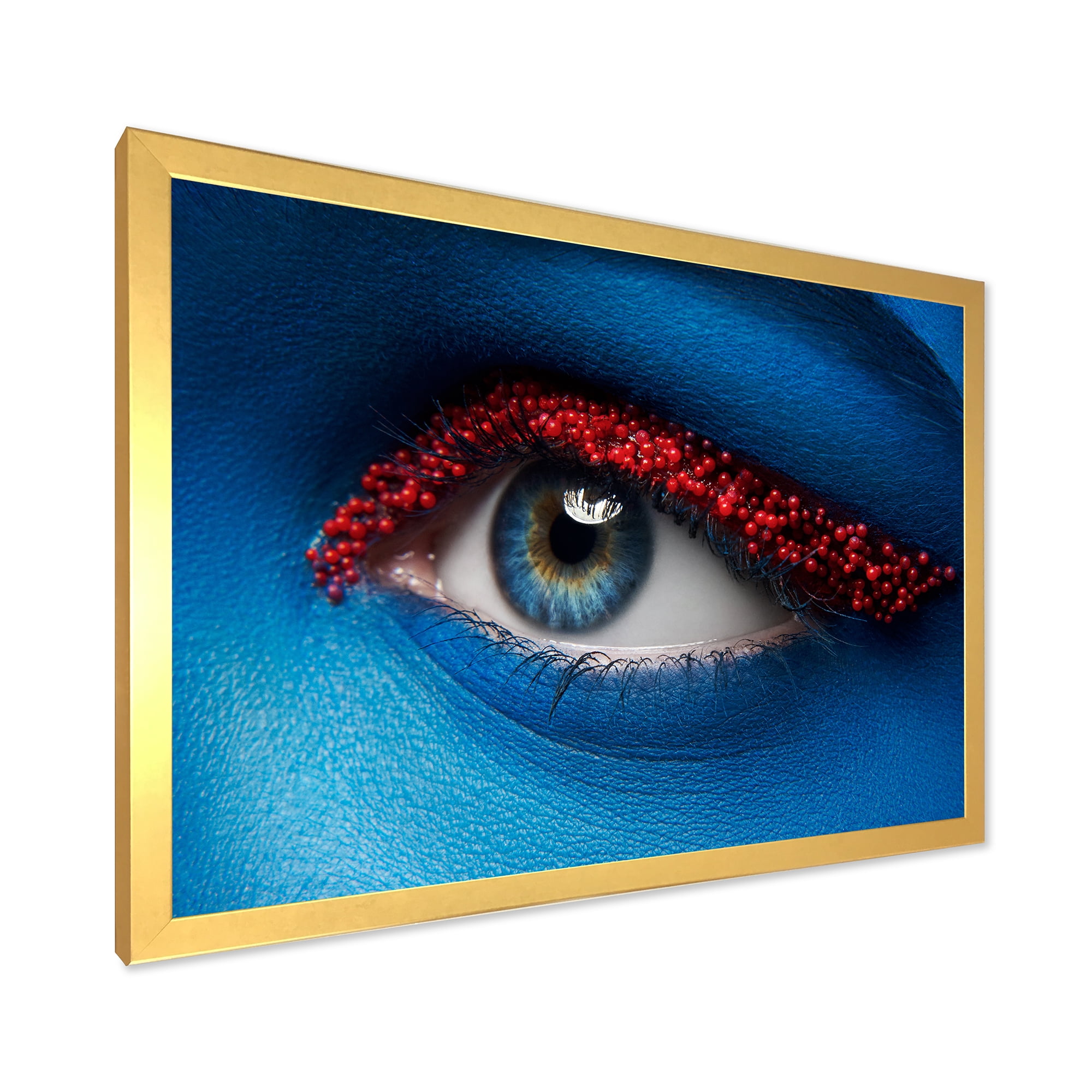 Designart 'Woman Eye With Blue Paint On Face & Red Balls' Modern Framed Art Print