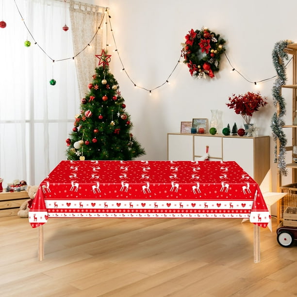 Adornos navideños, manteles de plástico, vajilla navideña con motivos navideños, ideal para fiestas y catering.