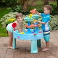 thumbnail image 2 of Step2 Nivel Freático de Doble Giro y Duchas Mesa de Actividades para Niños Pequeños Al Aire Libre con 22 Accesorios, Torre de Lluvia y Juego Acuático Giratorio, 2 of 5
