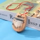 thumbnail image 5 of Instrumento musical Madera de caoba Pulgar Dedo Piano Mbira Mini 8 teclas Kalimba Barbie Nuevos Originales, 5 of 8