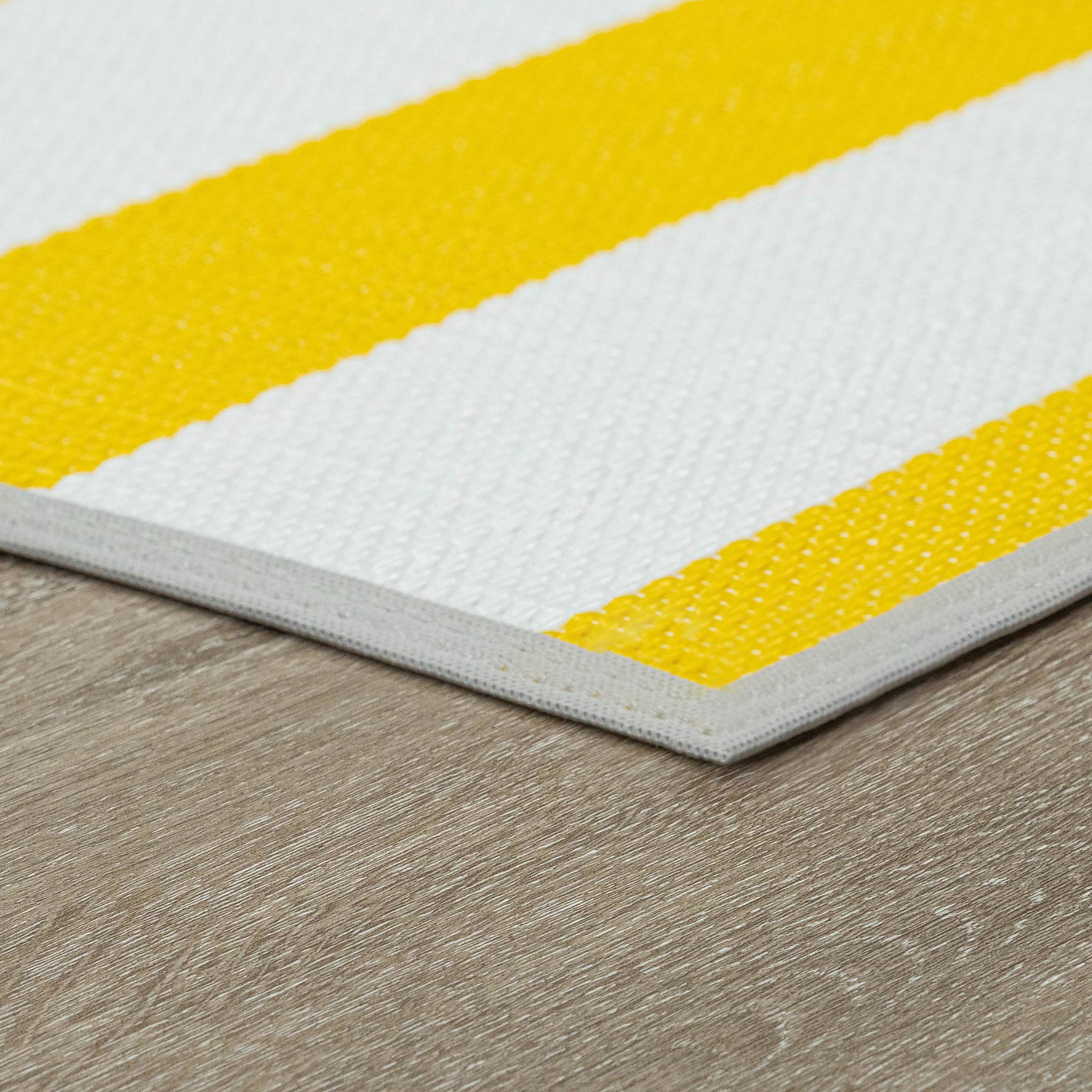 Luna Contemporary Stripe Yellow and White Polypropylene Reversible Plastic Straw Outdoor Area Rug, 5' x 6'11'' Rectangle