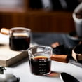 thumbnail image 6 of Ochine 2.5-Ounce Espresso Measuring Glass with Wooden Handle Double Spouts Espresso Shot Glass Measuring Cup Pitcher Barista Measuring Cups for Coffee Tea Milk Espresso Maple Syrup Juice Wine Serving, 6 of 10