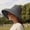 Black, variant on HNMKIU Sun Protective Wide Brim Straw Hat with Secure Lanyard for Women Summer Beach Outdoor Activities Black,One Size
