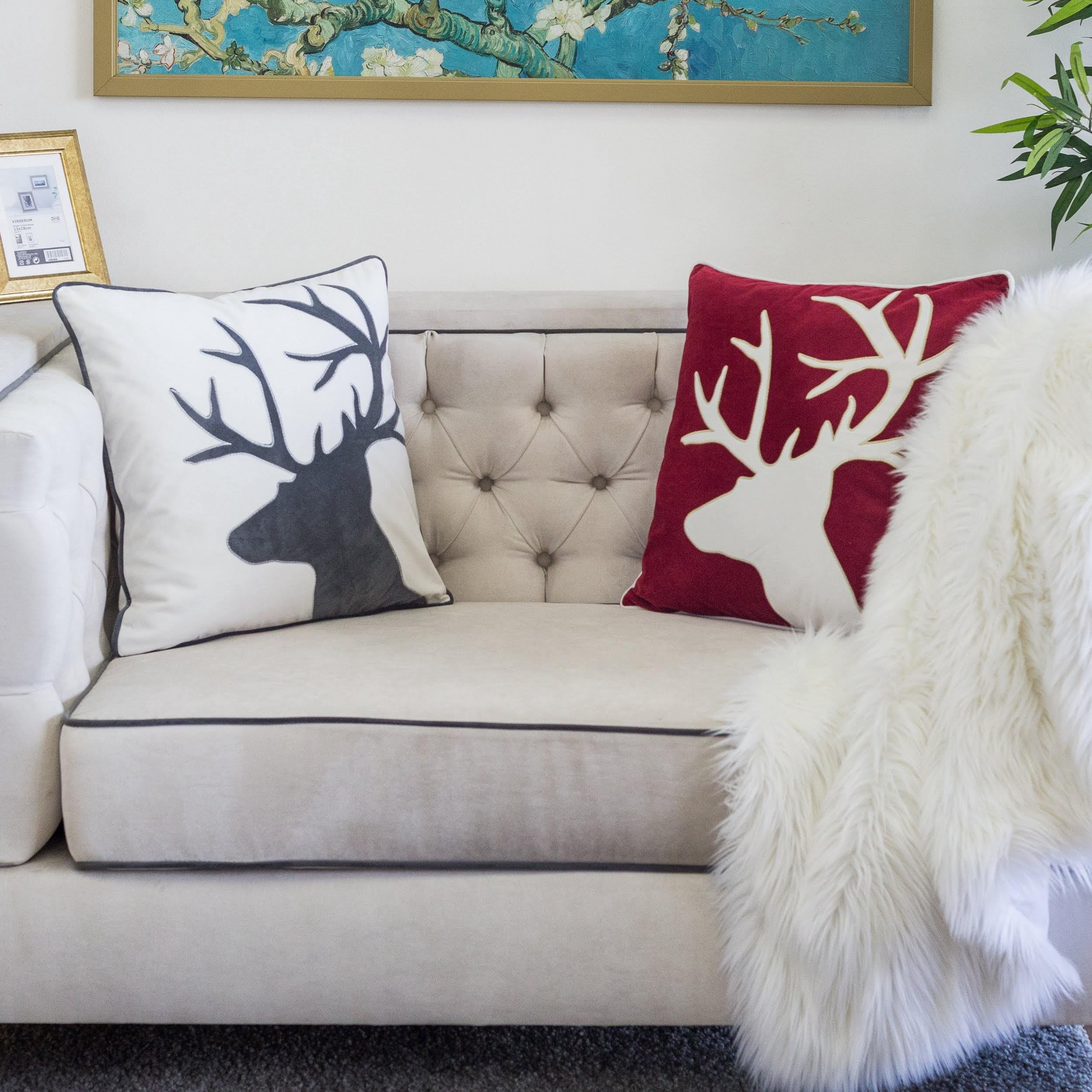 Reindeer White Animal Print Polyester 20 in. x 20 in. Throw Pillow
