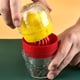 thumbnail image 4 of Exprimidor de limón manual portátil | Exprimidor manual para limón, lima y naranja | Herramienta de cocina compacta con colador de pulpa y vaso medidor | Rojo, verde y azul, 4 of 6