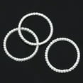 thumbnail image 2 of J183 - 50 pcs. Silver Plated Twisted Striped Connector Closed Jump Rings - 18mm - 1.3mm Thick, 2 of 3